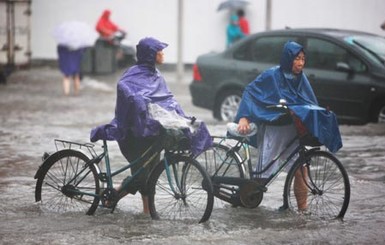 В Китае  26 человек погибли из-за тропических дождей