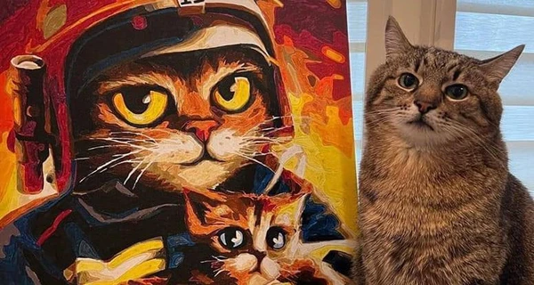 Харьковские спасатели подарили коту Степану картину с двумя котами